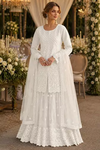 White heavy net readymade suit with embroidery & sequence work
