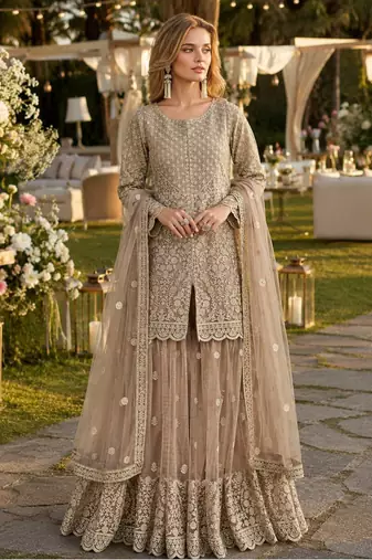 Cream heavy net readymade suit with embroidery & sequence work