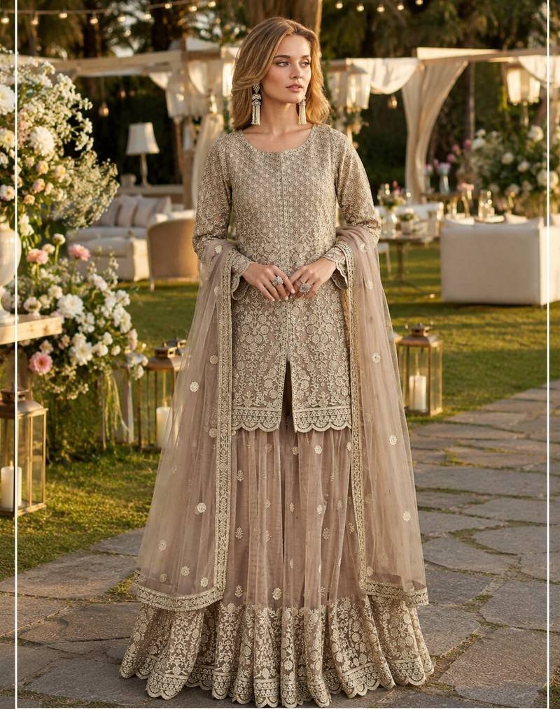 Cream heavy net readymade suit with embroidery & sequence work
