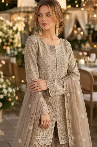 Cream heavy net readymade suit with embroidery & sequence work