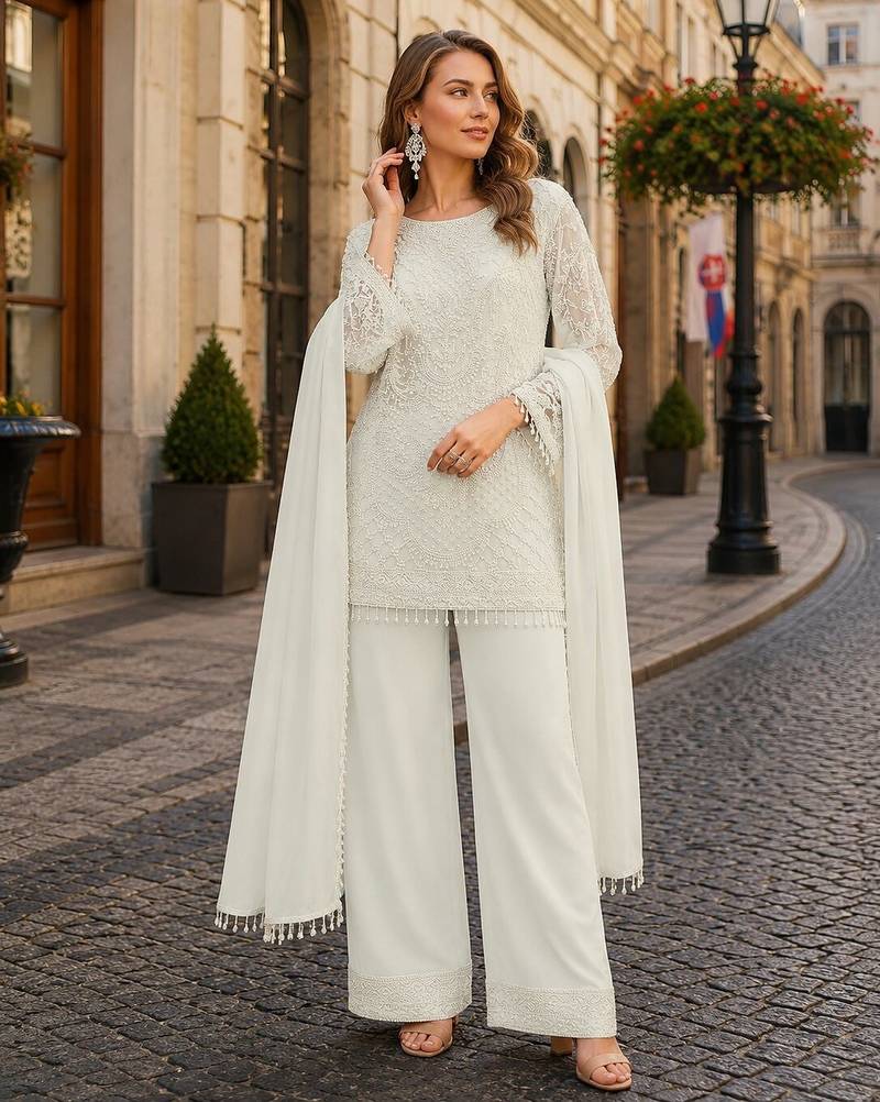 White georgette semi stitched suit with embroidered beads & sequence work