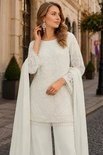 White georgette semi stitched suit with embroidered beads & sequence work