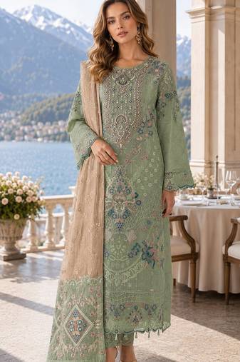 Green silk semi stitched suit with embroidery & sequence work