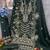 Green faux georgette semi stitched suit with embroidery work