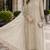 Cream fox georgette semi stitched suit with embroidered sequence work