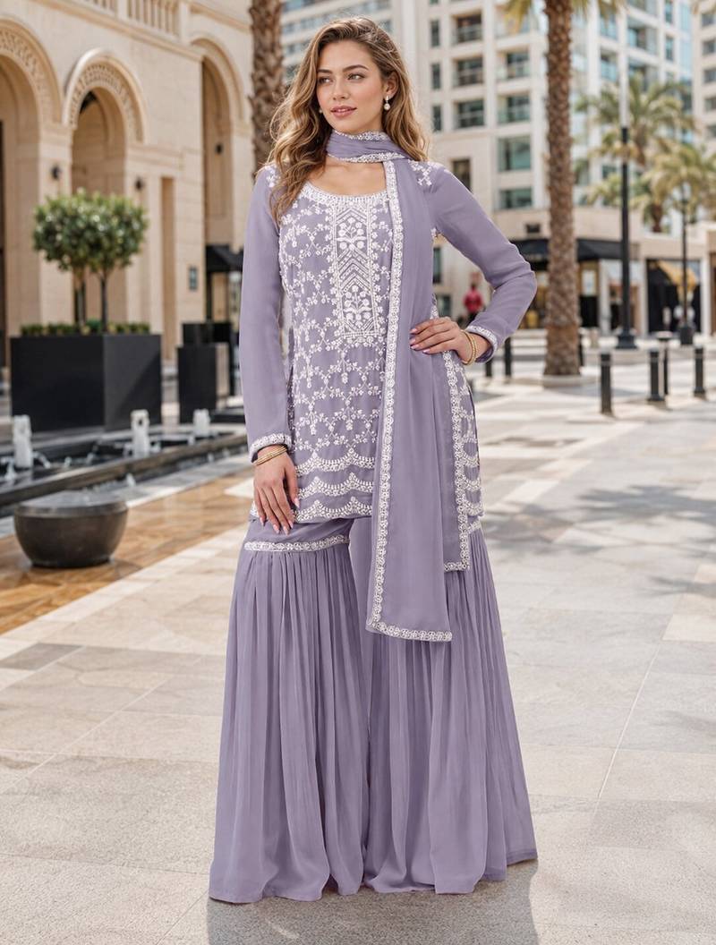 Lavender faux georgette semi stitched suit with embroidery cotton thread & sequence work