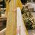 Yellow cambric cotton semi stitched suit with embroidery & khatli work