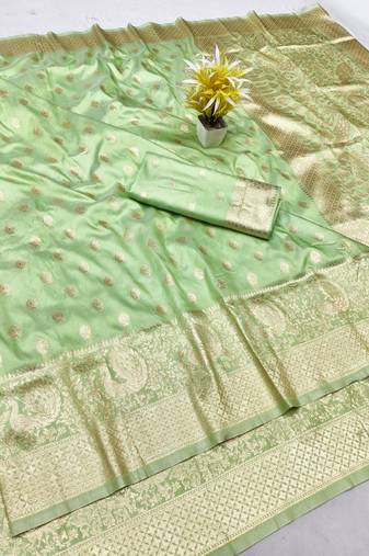 Light green zari woven banarasi silk traditional saree with blouse piece