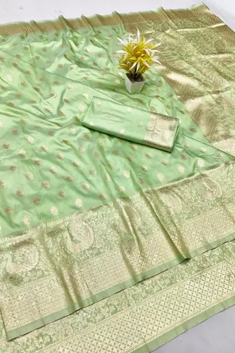 Light green zari woven silk traditional saree with blouse piece