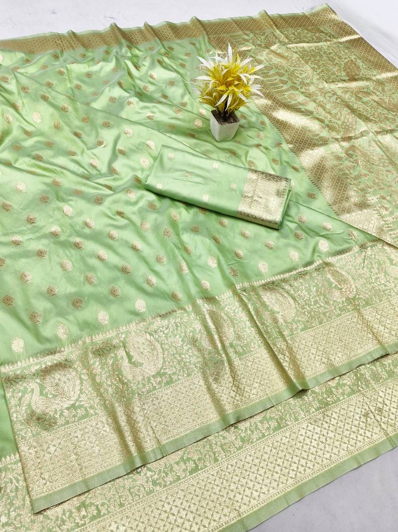 Light green zari woven banarasi silk traditional saree with blouse piece