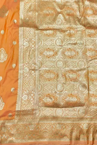 Light orange zari woven silk traditional saree with blouse piece