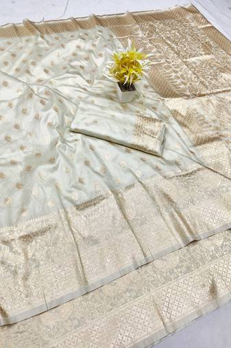 Cream zari woven banarasi silk traditional saree with blouse piece