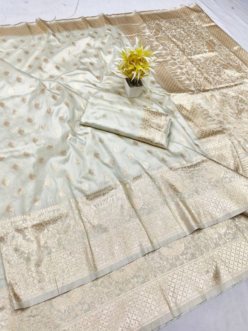 Cream zari woven banarasi silk traditional saree with blouse piece