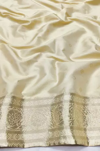 Cream zari woven silk traditional saree with blouse piece