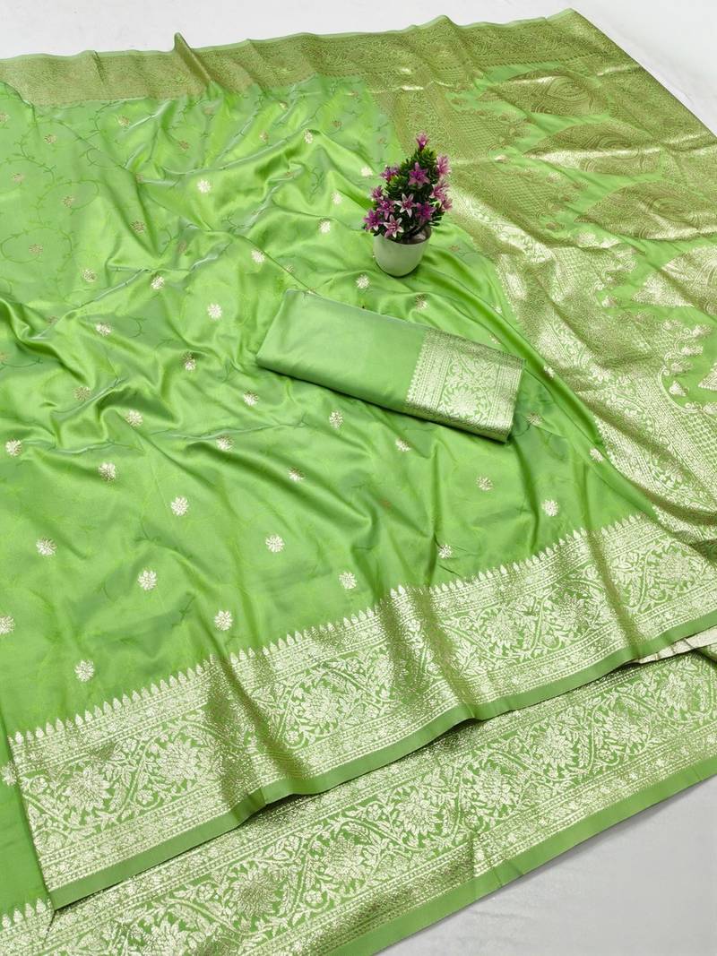 Light green zari woven banarasi silk traditional saree with blouse piece