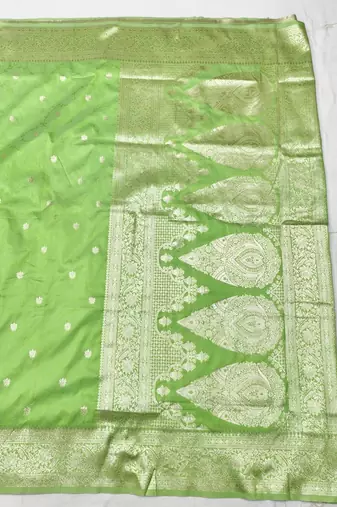 Light green zari woven silk traditional saree with blouse piece