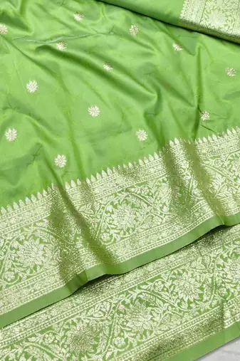 Light green zari woven silk traditional saree with blouse piece