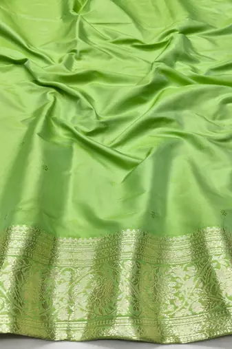 Light green zari woven silk traditional saree with blouse piece