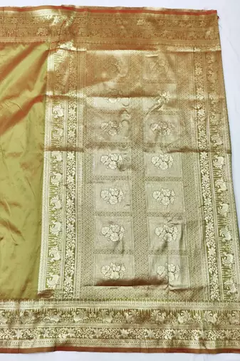 Mehendi zari woven silk traditional saree with blouse piece