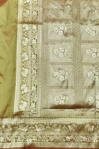 Mehendi zari woven silk traditional saree with blouse piece