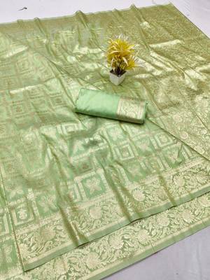 Light green zari woven silk traditional saree with blouse piece 1