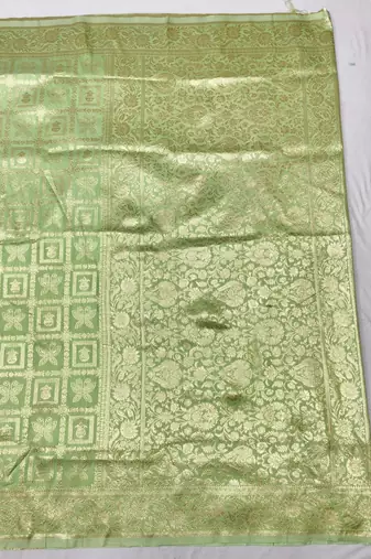 Light green zari woven silk traditional saree with blouse piece