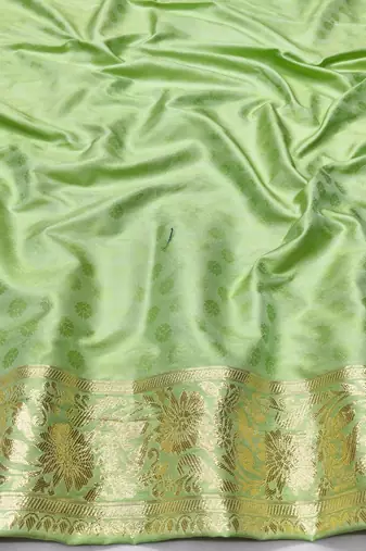 Light green zari woven silk traditional saree with blouse piece