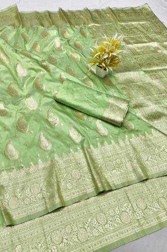 Light green zari woven silk traditional saree with blouse piece