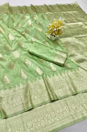 Light green zari woven silk traditional saree with blouse piece