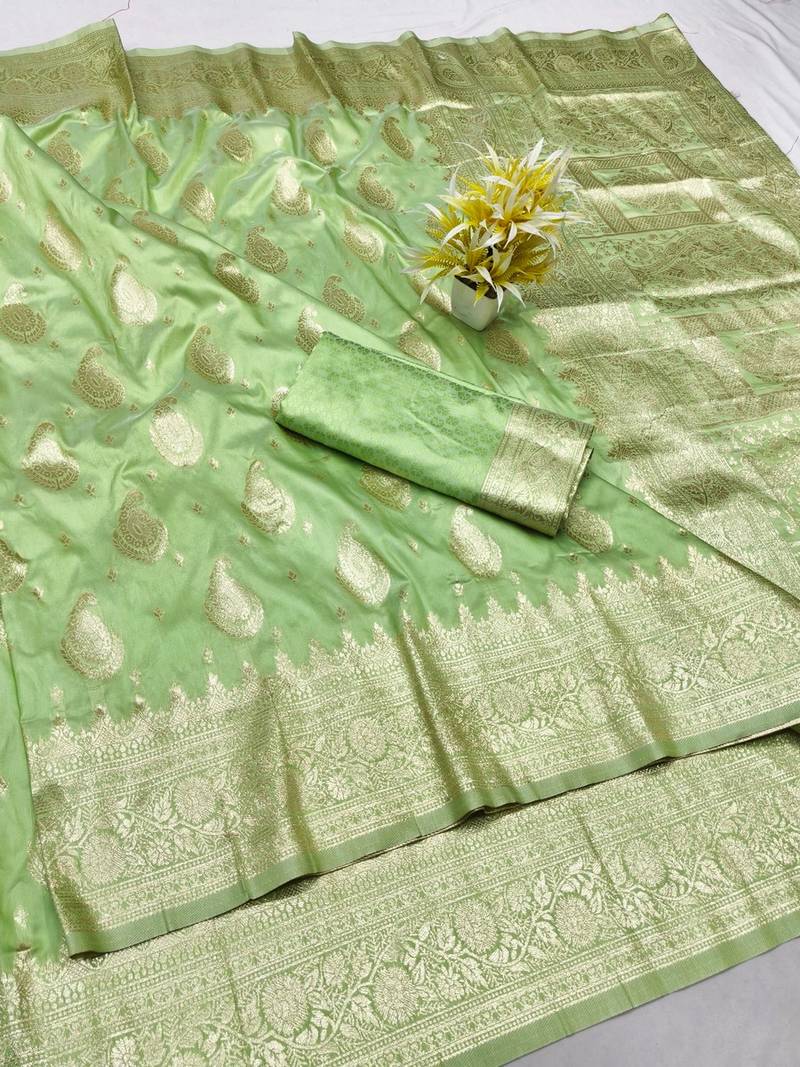 Light green zari woven banarasi silk traditional saree with blouse piece