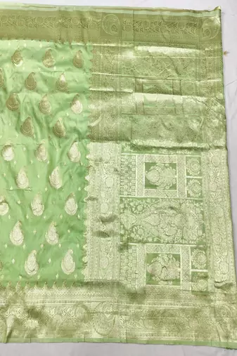 Light green zari woven silk traditional saree with blouse piece