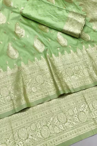 Light green zari woven silk traditional saree with blouse piece