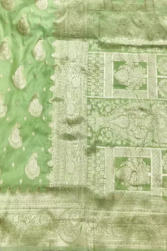 Light green zari woven silk traditional saree with blouse piece