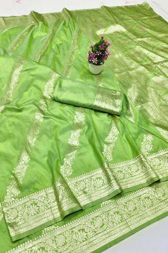 Light green zari woven silk traditional saree with blouse piece