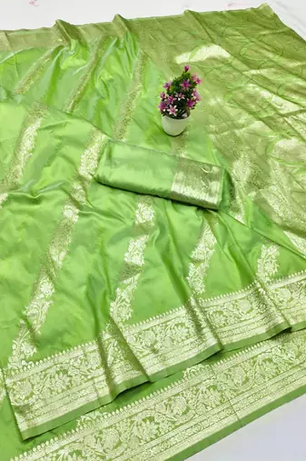 Light green zari woven silk traditional saree with blouse piece