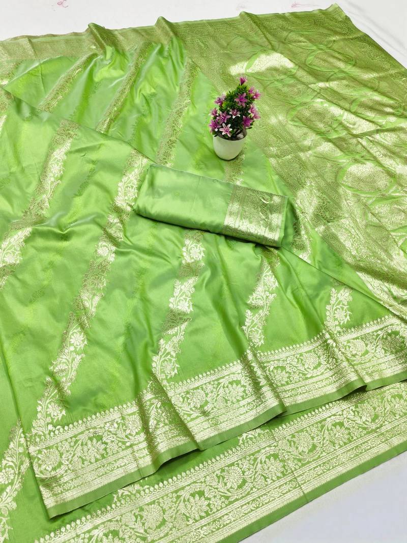Light green zari woven banarasi silk traditional saree with blouse piece
