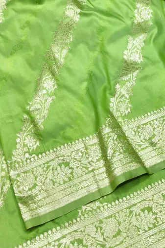 Light green zari woven silk traditional saree with blouse piece