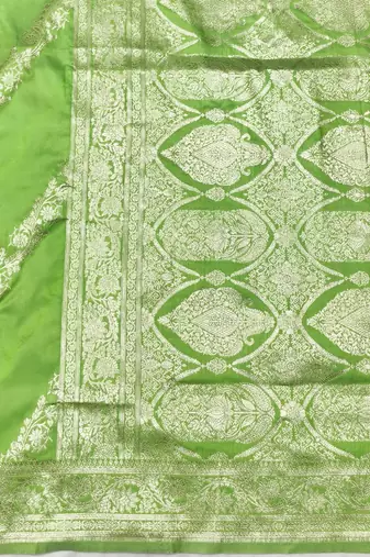 Light green zari woven silk traditional saree with blouse piece