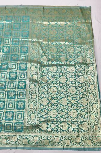 Light blue zari woven silk traditional saree with blouse piece
