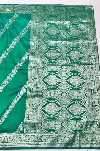 Green zari woven silk traditional saree with blouse piece