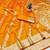 Mustard zari woven banarasi silk traditional saree with blouse piece
