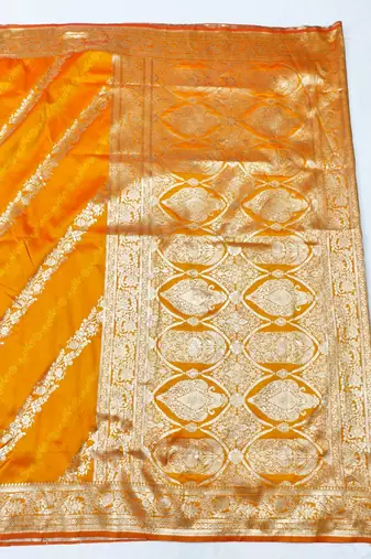 Mustard zari woven silk traditional saree with blouse piece