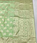 Light green zari woven banarasi silk traditional saree with blouse piece