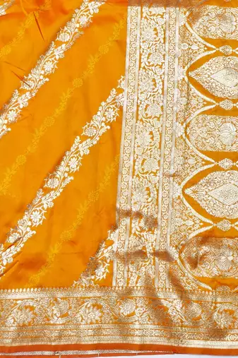 Mustard zari woven silk traditional saree with blouse piece
