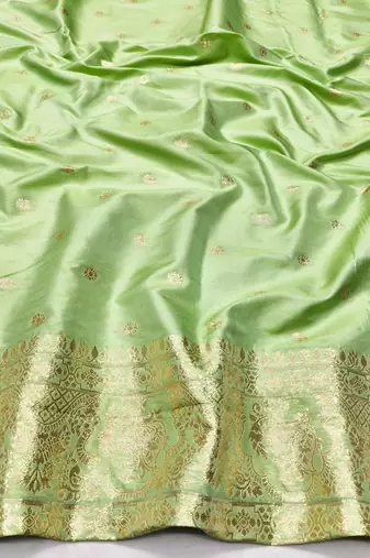 Light green zari woven banarasi silk traditional saree with blouse piece