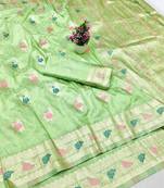 Light green zari woven banarasi silk traditional saree with blouse piece