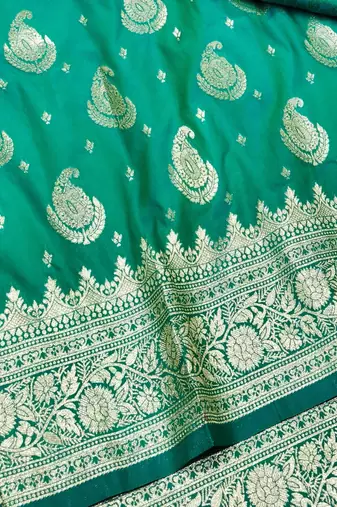 Green zari woven silk traditional saree with blouse piece
