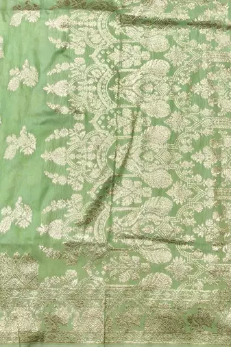 Light green zari woven banarasi silk traditional saree with blouse piece