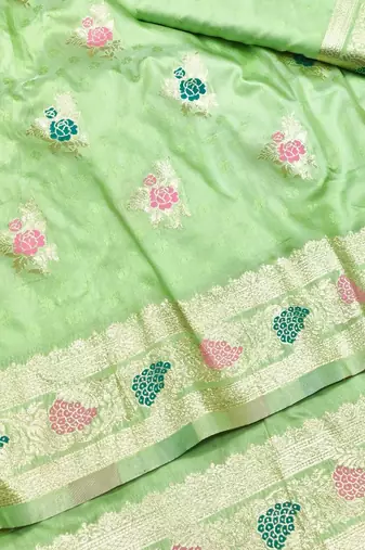 Light green zari woven silk traditional saree with blouse piece