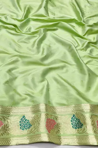 Light green zari woven silk traditional saree with blouse piece